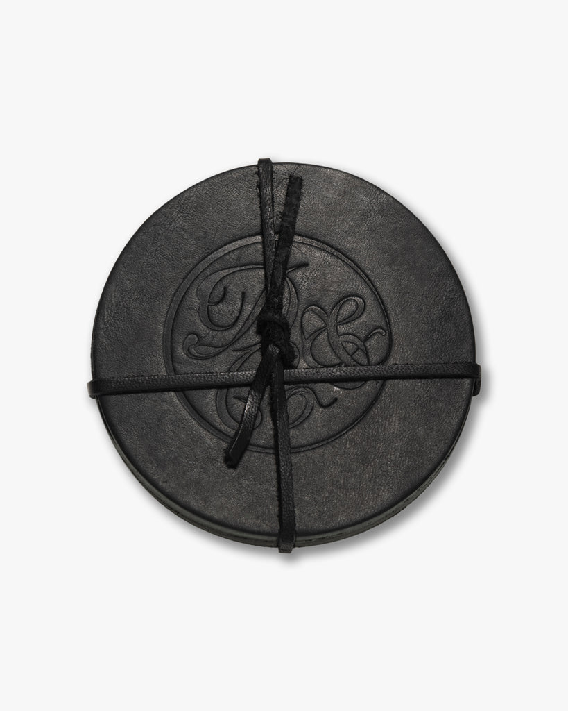 circular leather death & co. coasters (set of 4)