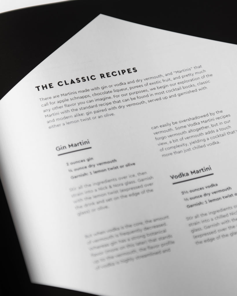 close up of "cocktail codex: fundamentals, formulas, evolutions" book page of the classic recipes 