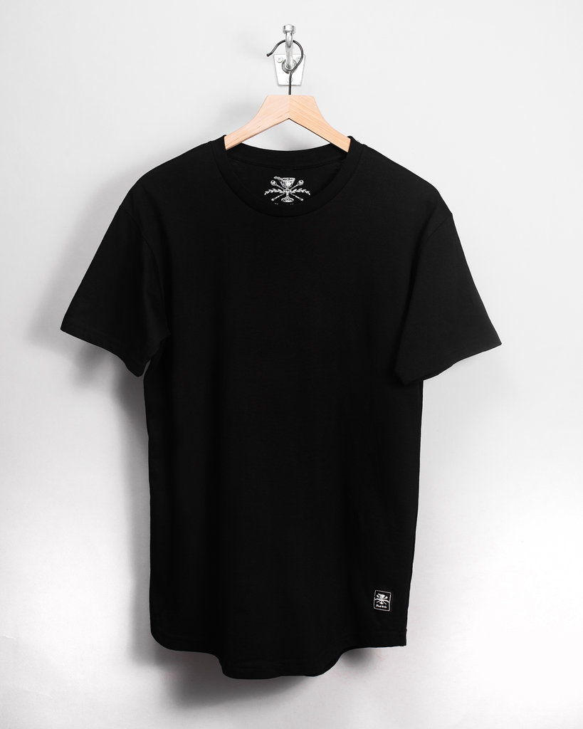 black t-shirt on hanger with crest patch in bottom corner 