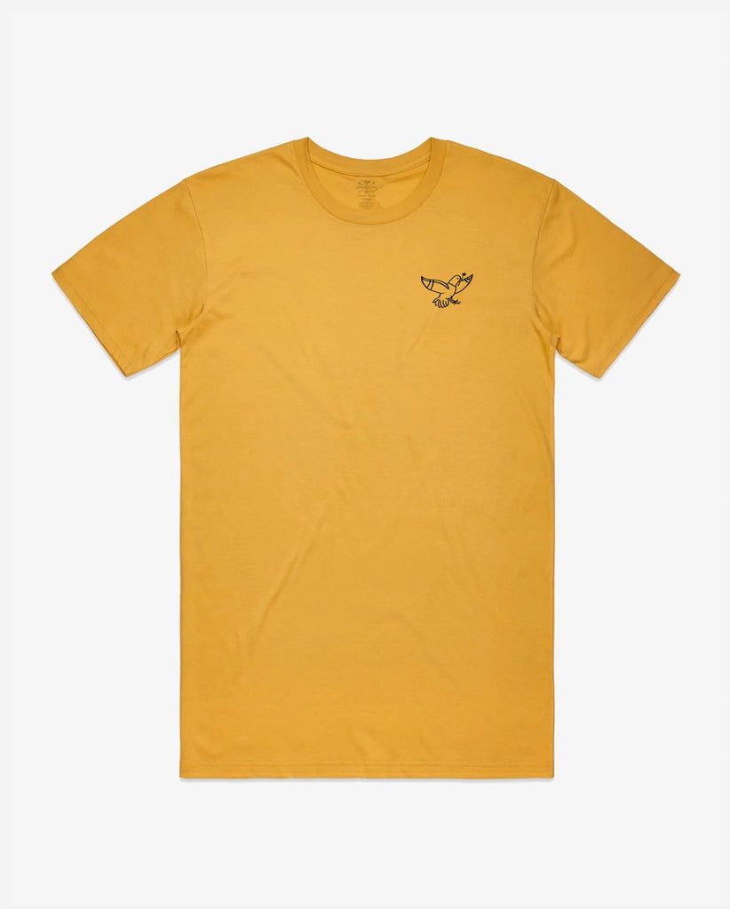 front of gold tee with pigeon graphic on pocket 
