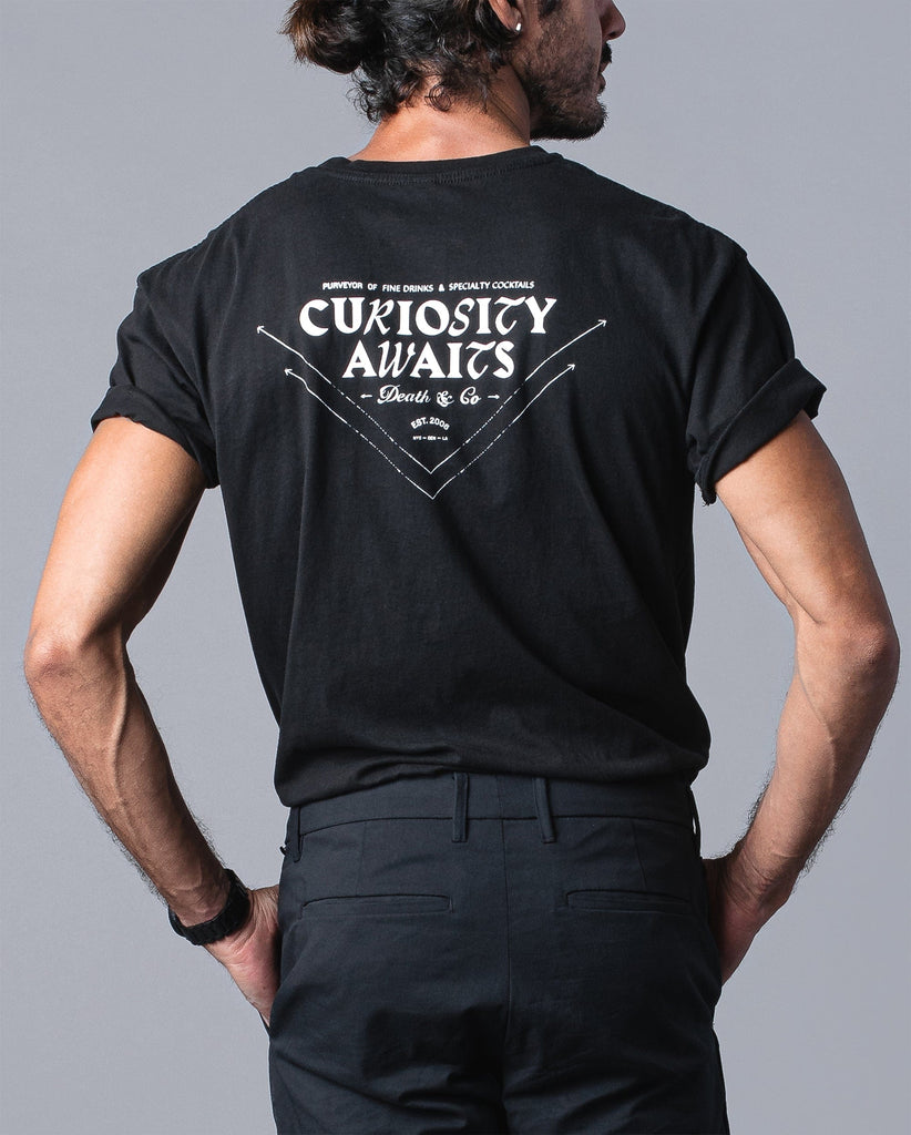 APPAREL Curiosity Awaits Tee