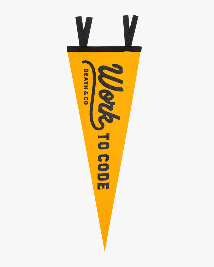 yellow wool felt pennant with "work to code"